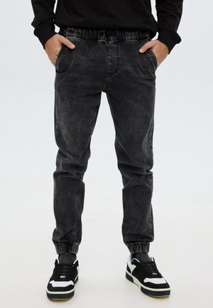 JOGGER - Vaqueros tapered - black