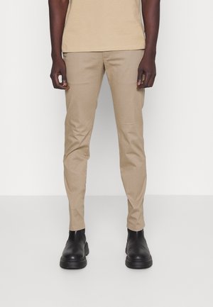 Pantaloni - beige