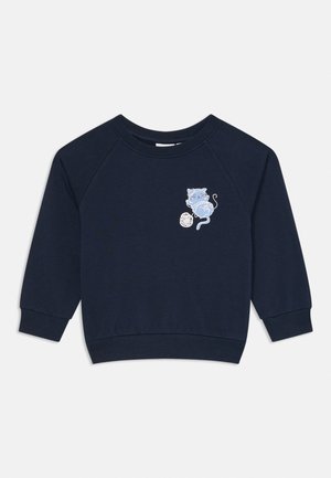 Navy blue long-sleeve children's sweatshirt with ribbed cuffs, neckline, hem, and a small cat playing with yarn graphic on the chest.
