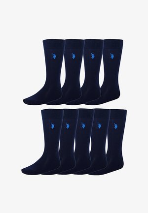 Ti par mørkeblå crew-strømper, hver med et lille lyseblåt broderet polo-spiller logo nær den øverste kant.