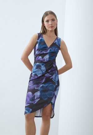 Floral dress featuring large blue and purple flowers on a dark background. V-neckline, sleeveless design, and asymmetrical hem.