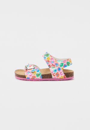 Sandale enfant avec semelle rose, première en liège, brides imprimé léopard colorées, une avec boucle et une avec fermeture auto-agrippante.