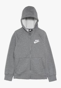 Grå zip-up hoodie gjord av mjuk tyg, med huva, framfickor och en vit Nike-logotyp på vänster bröst.