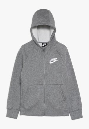 Grijze rits hoodie van zachte stof, met een capuchon, voorkantzakken en een wit Nike-logo op de linkerborst.