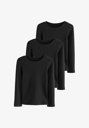 Tres camisetas negras de manga larga y cuello redondo apiladas con ligero solapamiento, exhibidas sobre un fondo blanco liso.