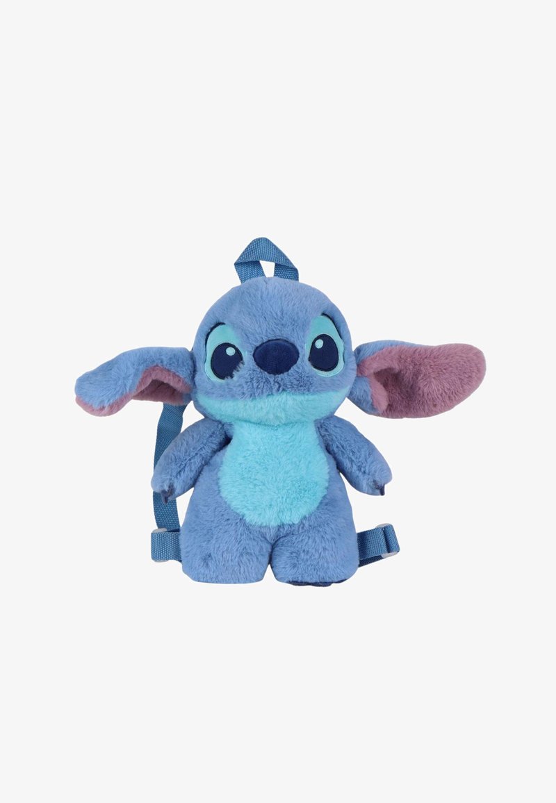 Sac à dos en peluche bleu en forme d'extraterrestre de dessin animé avec de grandes oreilles, de grands yeux et un ventre bleu clair, présenté sur un fond blanc.