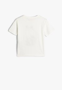 Hvid bomulds t-shirt med korte ærmer, rund halsudskæring og uden tryk eller udsmykninger. Glat tekstur, standard pasform, enkelt design.