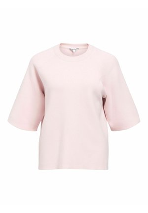T-shirt rose clair à manches courtes et col rond, coupe décontractée avec des manches légèrement larges, présenté sur un fond blanc.