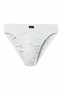 Weiße Baumwollslips mit einem elastischen Bund, die an den Seiten gerafft sind und ein kleines schwarzes Etikett mit "H.I.S" auf dem vorderen Bund haben.