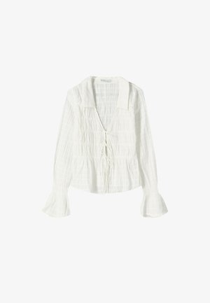 Witte blouse met lange mouwen, voorzien van een textuurstof, een V-hals met een strikdetail en uitlopende mouwen voor een extra ontwerp.
