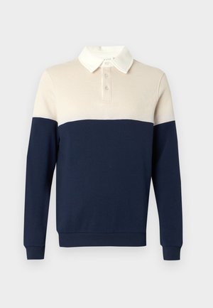 Marškinėliai ilgomis rankovėmis su baltu apykaklės ir viršutinės dalies, tamsiai mėlynos apatinės dalies ir rankovių, priekyje su sagų sąvarža.