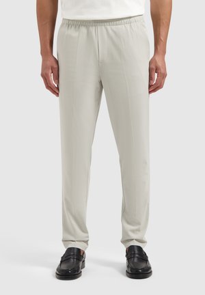 Light gray, elastic waistband trousers with a relaxed fit and smooth texture, featuring side pockets and a straight leg design.