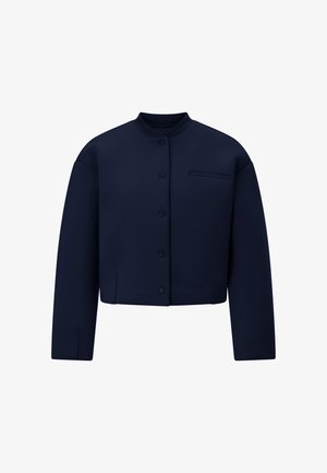 Tamsiai mėlynas trumpas švarkelis su apvalia iškirpte, užsegamas sagomis ir mažomis kišenėlėmis krūtinės srityje. Pagamintas iš lygaus audinio, su laisvomis rankovėmis.