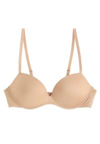 Soutien-gorge nude avec rembourrage et armatures, texture lisse, bretelles réglables et design sans coutures, avec un motif côtelé subtil sur les bonnets.