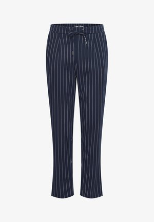 Pantalons bleu marine avec une taille à cordon de serrage, ornés de bandes verticales blanches. Fabriqués dans un matériau doux, ils sont coupés pour un ajustement décontracté.