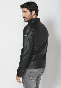 Koroshi SKIN EFFECT - Giacca in similpelle - black