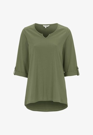 Olive green, three-quarter sleeve top with a V-neck and rolled cuffs. Made from a smooth, soft material, featuring a slightly curved hem.
