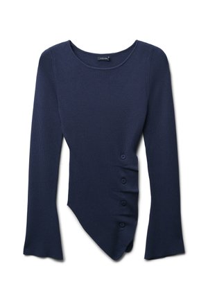 Haut à manches longues bleu marine avec un col rond, texture côtelée, ourlet asymétrique et cinq boutons sur le côté gauche.