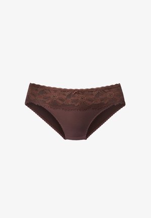 Ruske lace-trimmed aluspesu, jossa on pehmeä kangas runko, kukkakuvioinen pitsikoristelu vyötäröllä ja aaltoilevat reunat helman kohdalla.