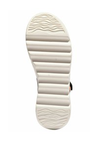 Biała podpodeszwa buta z wypukłymi poziomymi i falistymi wzorami. Projekt zawiera żebrowaną fakturę dla lepszej przyczepności i trakcji.