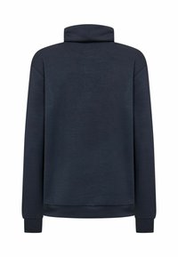 Pulover bleumarin cu guler înalt, mâneci lungi și manșete răsucite. Confecționat dintr-un amestec moale de bumbac, cu o suprafață texturată.