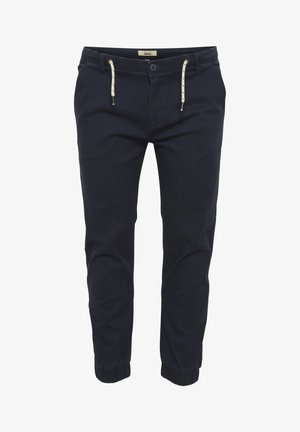 Mørkeblå joggebukser laget av bomullsblandingsstoff, med elastisk midje, snøring og ribbestrikkede mansjetter.