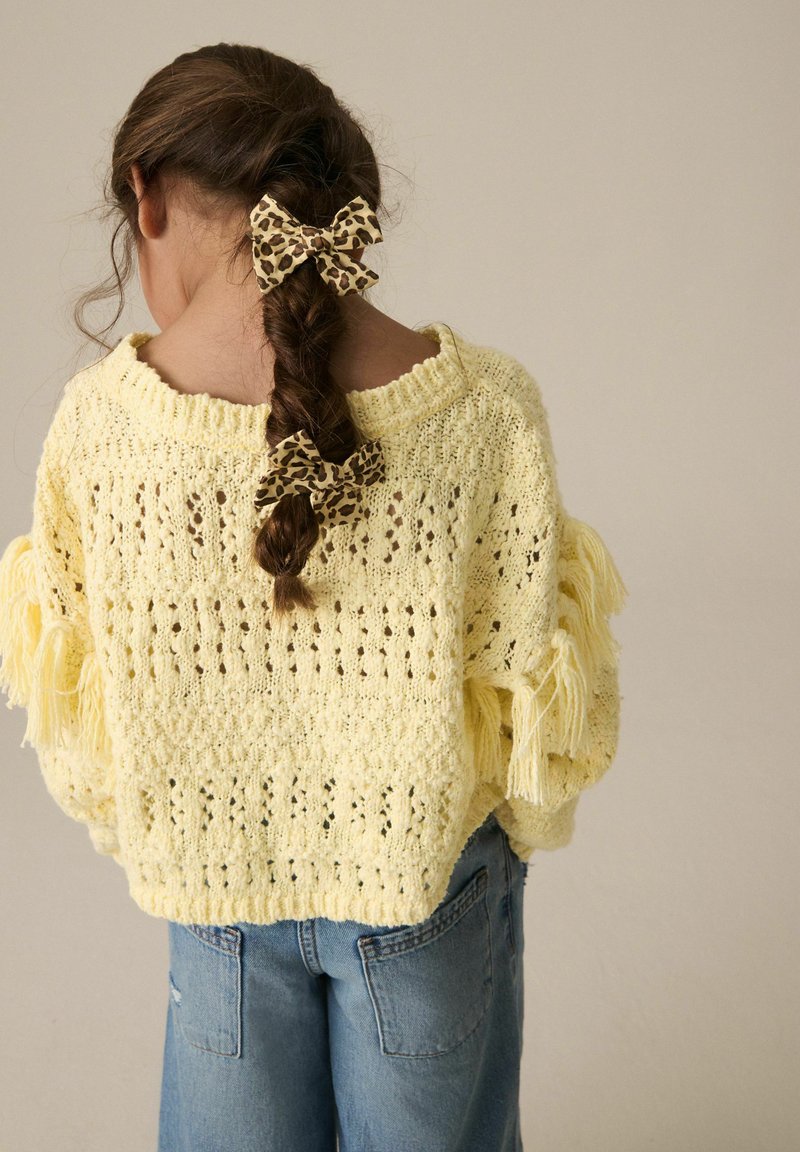 Haut Court Zara – Tricot Ouvert Crochet Rayé Multicolore – Taille S