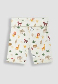 Lyocellita shorts, joissa on vaalea kerma-tausta ja värikkäitä eläinkuvioita, kuten leijonia, elefantteja ja kirahveja, sekä vihreitä lehtiyksityiskohtia.