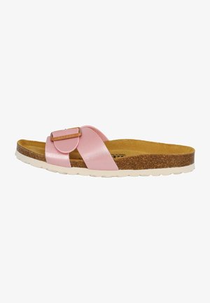 Pink slide sandal with two crossing synthetic straps and a metal buckle accent. Cork footbed and white rubber outsole, textured for grip.