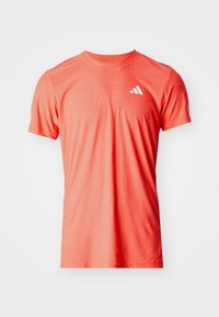 TENNIS PRO CLIMACOOL+ FREELIFT - Tekninen t-paita - semi lucid red