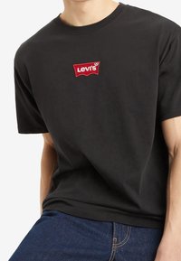 Levi's® T-shirt med print - black