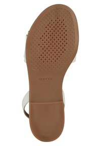Suola di sandalo bianca con motivo perforato, materiale in gomma marrone chiaro, logo embossato "GEOX ITALIAN PATENT" e dettagli a superficie liscia.
