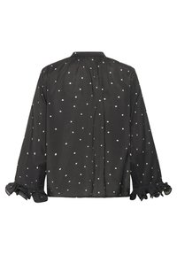 Sort bluse med hvide prikker, blødt stof, lange ærmer med rynkede manchetter og en samlet halsudskæring bagpå.