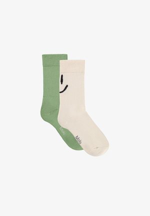 Dvi kojinės: viena žalia su brūkšniniais raštai, kita kremiška su juodu šypsenėle. Medvilnės mišinys, vidutinės kulkšnies ilgio, su atspausdintu tekstu ant padų.