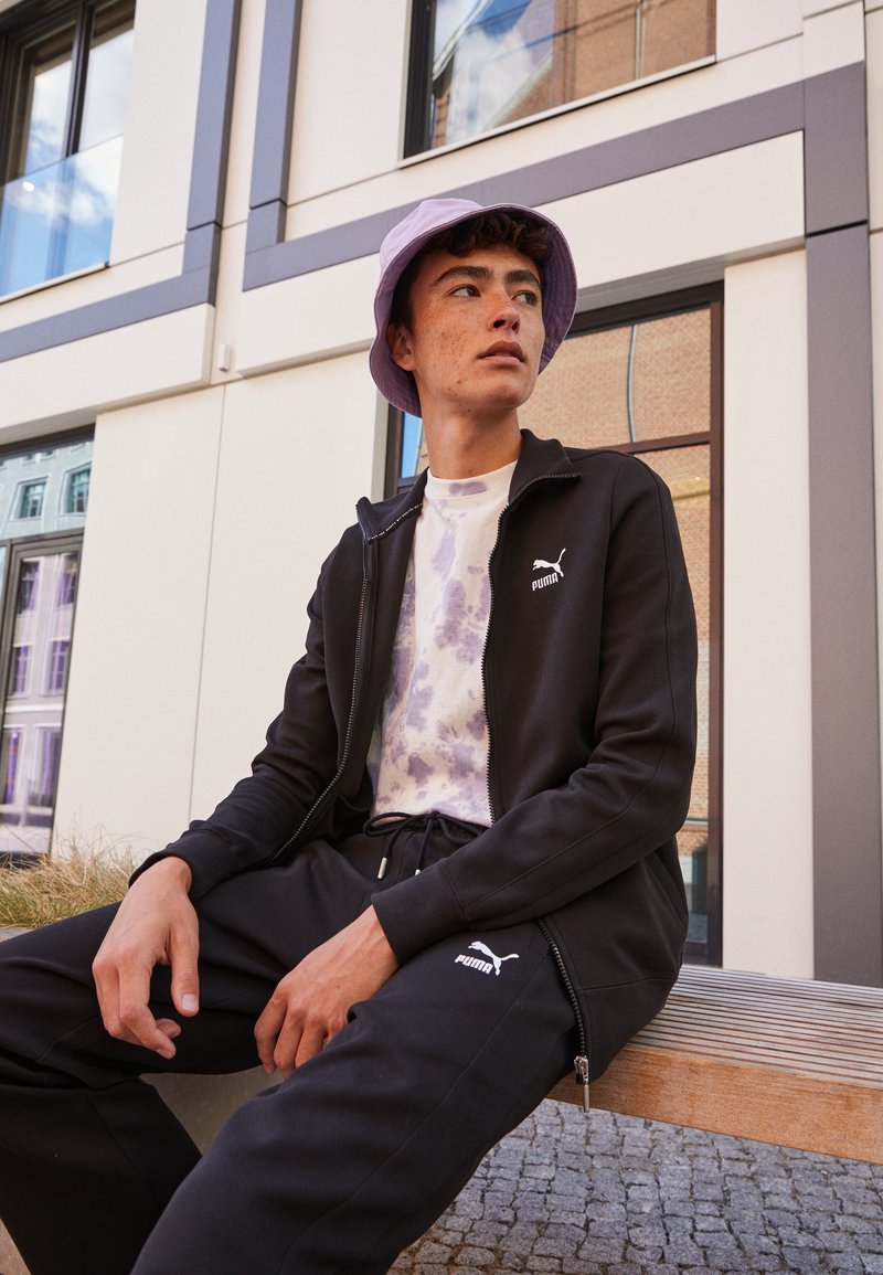 Puma TRACK PANTS - Teplákové kalhoty - black