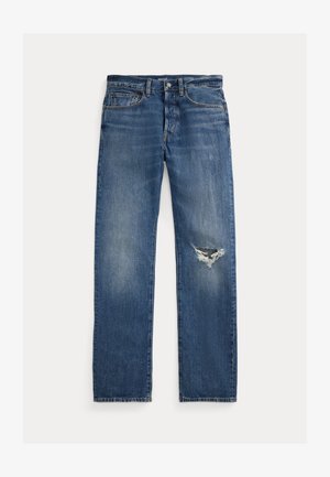 Jeans de mezclilla azul con un corte recto, que presentan una zona desgastada en la rodilla izquierda y un ligero desvanecimiento en toda la tela.