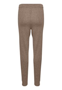 Joggers de punto marrones, con una textura suave, cinturilla elástica y piernas ajustadas. Sin patrones discernibles ni detalles de hardware visibles.