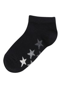 Calzino nero alla caviglia con bordo a coste e motivo di stelle argentate lungo il lato. Realizzato in tessuto morbido con una texture liscia.