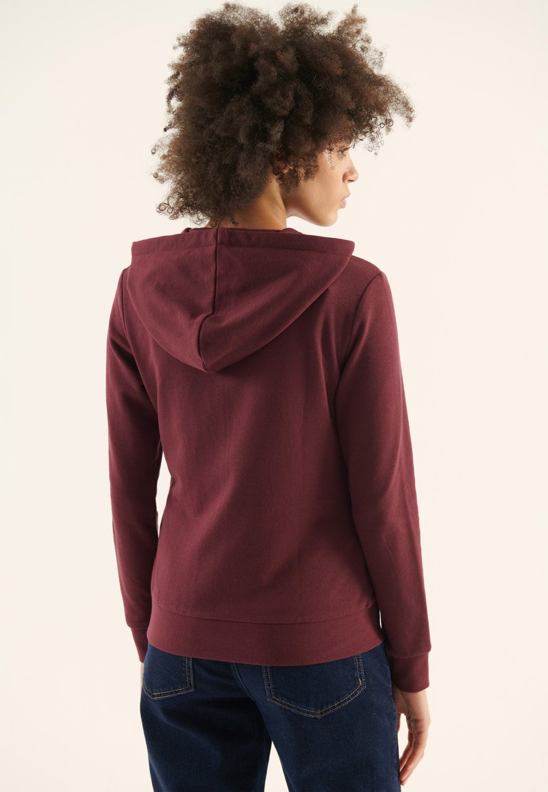 Sac banane zippé bordeaux femme