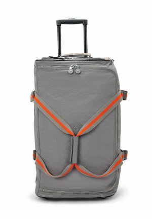 Grey wheeled backpack with dual zippers, adjustable orange and grey straps, and a circular logo. Features a telescopic handle and durable material.