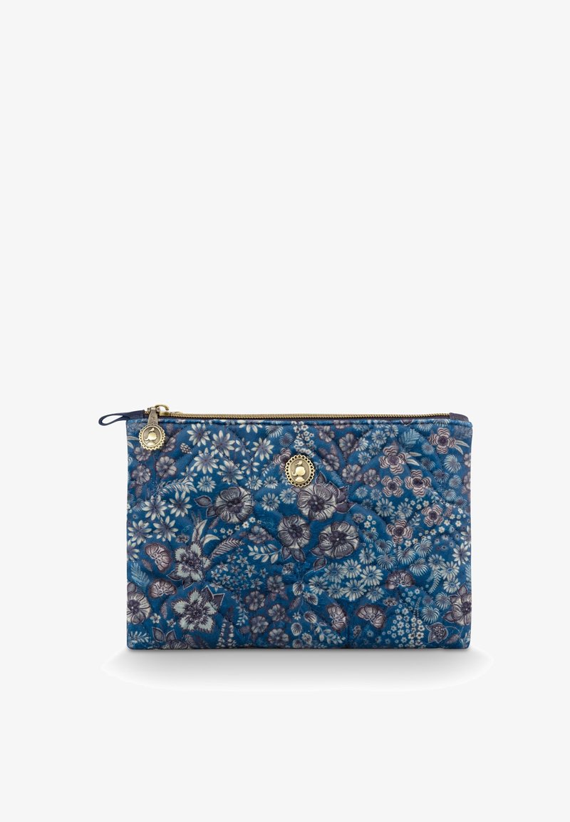 Blue floral quilted pouch featuring a gold zipper and circular hardware. Design includes a variety of flowers and plants in darker shades.
