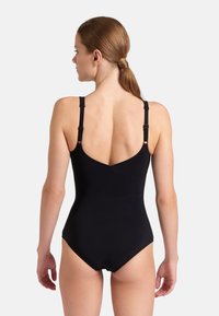 Black one-piece swimsuit with adjustable straps, featuring a deep back neckline and smooth texture. No notable patterns or accents.