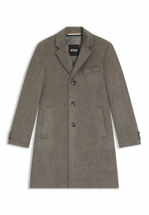 Cappotto lungo da uomo in misto lana grigia con texture. Le caratteristiche principali includono un colletto a punta, tre bottoni frontali e due tasche laterali.