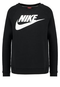 Czarna bluza z bawełnianej mieszanki, z wyraźnym białym logo Nike na piersi, ściągaczami przy rękawach i u dołu.