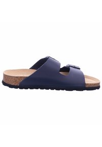 Navy blue slip-on sandal with cork footbed, adjustable straps, and textured rubber sole. Features two buckle accents on the upper.