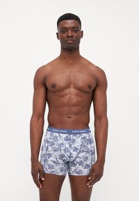 Boxershorts mit einem blau-weißen Palmenblattmuster, aus weicher Baumwolle, mit einem elastischen Bund mit Logo.