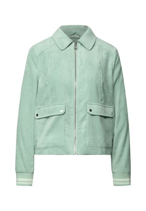 Veste en corduroy vert menthe avec fermeture éclair à l'avant, col et deux poches avant avec des boutons noirs. Poignets côtelés avec de légères rayures.