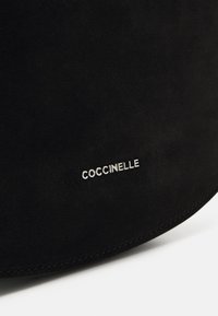 Coccinelle SUNUP - Kézitáska - noir