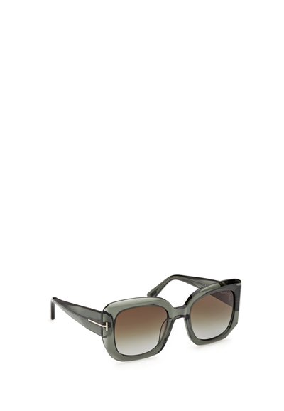 Lunettes de soleil carrées noires translucides avec verres marron dégradés et fins accents métalliques argentés en forme de T sur les branches.