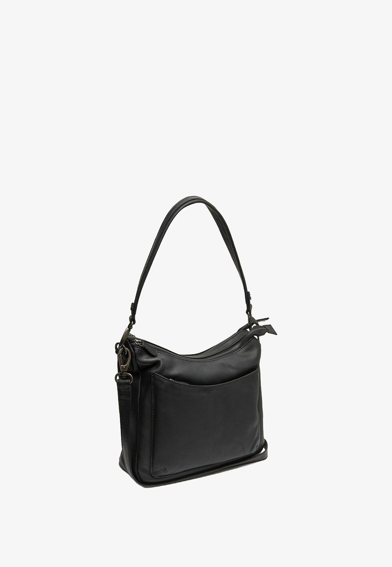 Sac à bandoulière en cuir noir avec une seule poignée, fermeture éclair et poche avant. Texture lisse et design minimaliste sans marque visible.